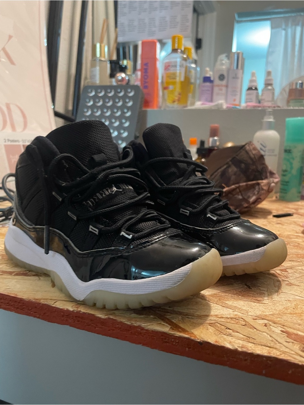 Kids Jordan 11s Black Concord Low-Top Sneakers